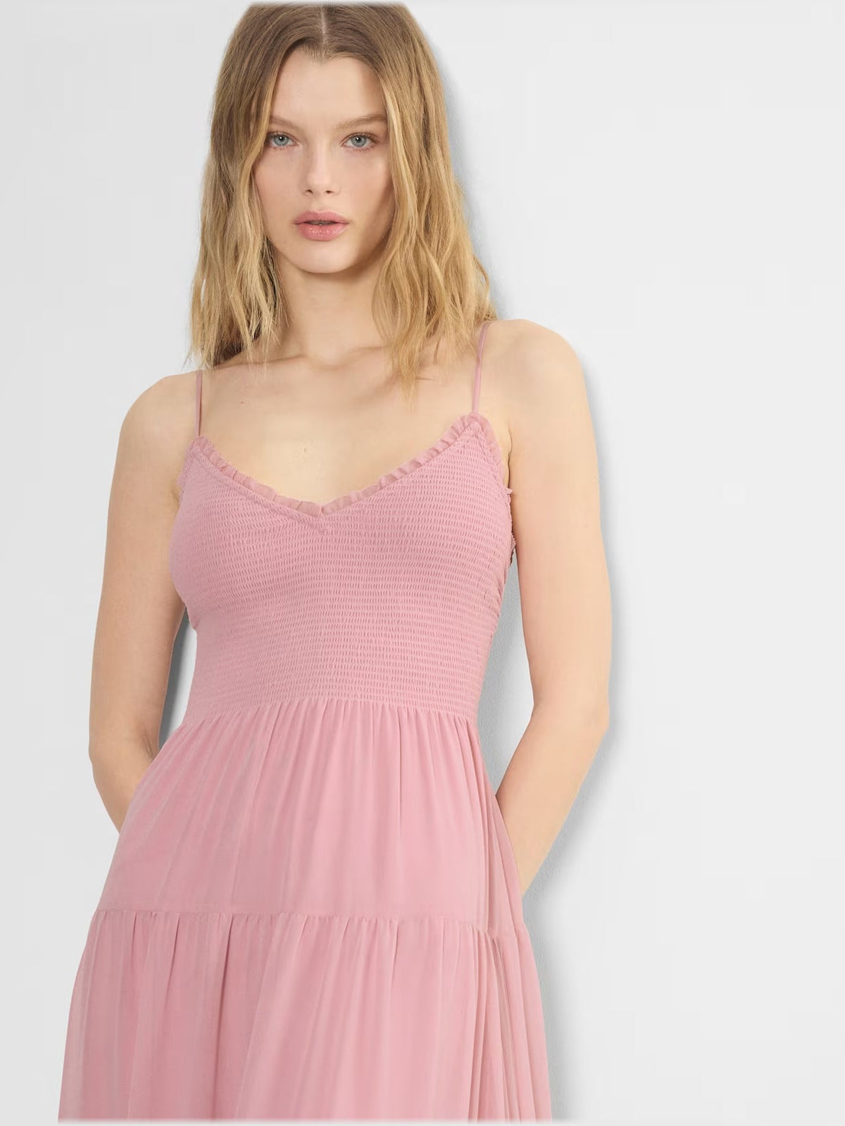 Pink chiffon midi dress with V-neck and thin spaghetti straps, tiered ruffle skirt