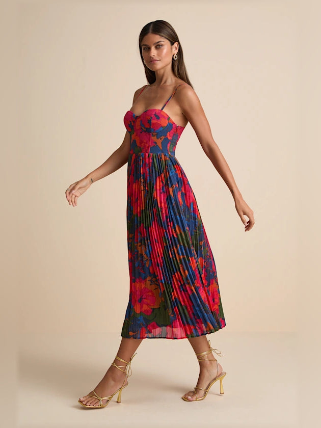 Pleated midi formal dress side view with pleated skirt and dark blue multi floral print