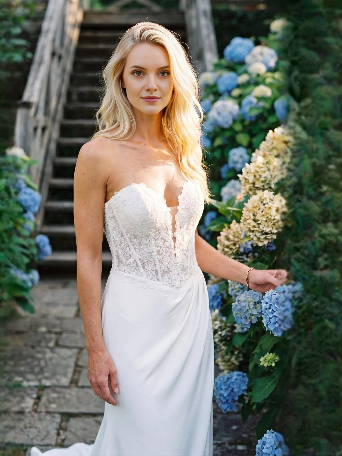 Ivory sleeveless sweetheart lace corset wedding dress with draped front and front slit