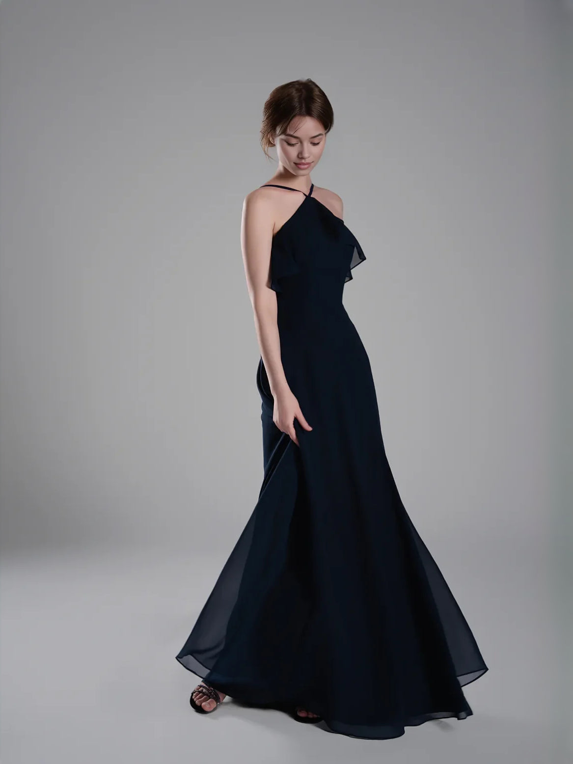 Dark navy chiffon bridesmaid dress with halter neckline, ruffled shoulder, and A-line skirt