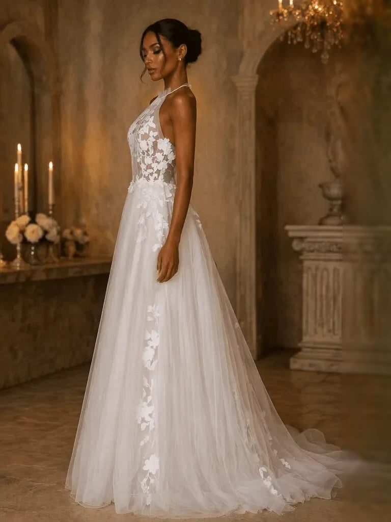 Ivory halter A-line tulle wedding dress with floral lace appliques and long skirt