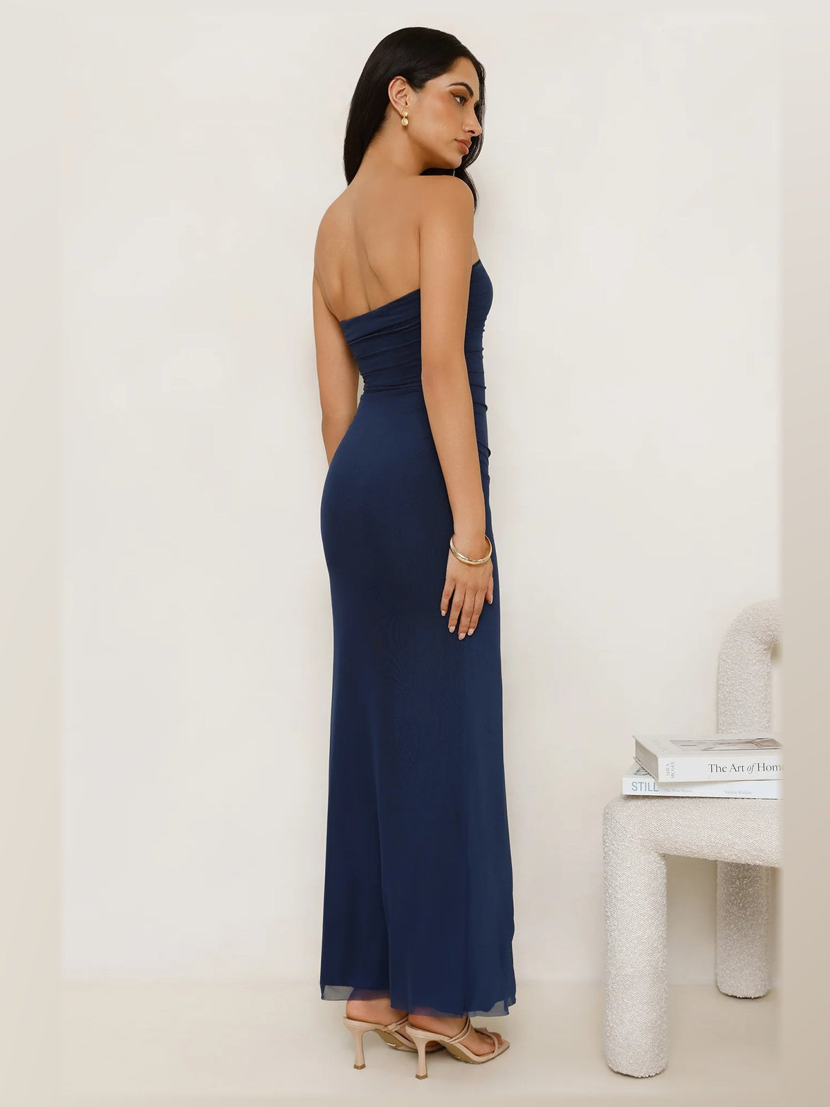 Navy formal dress with mesh construction and maxi hem