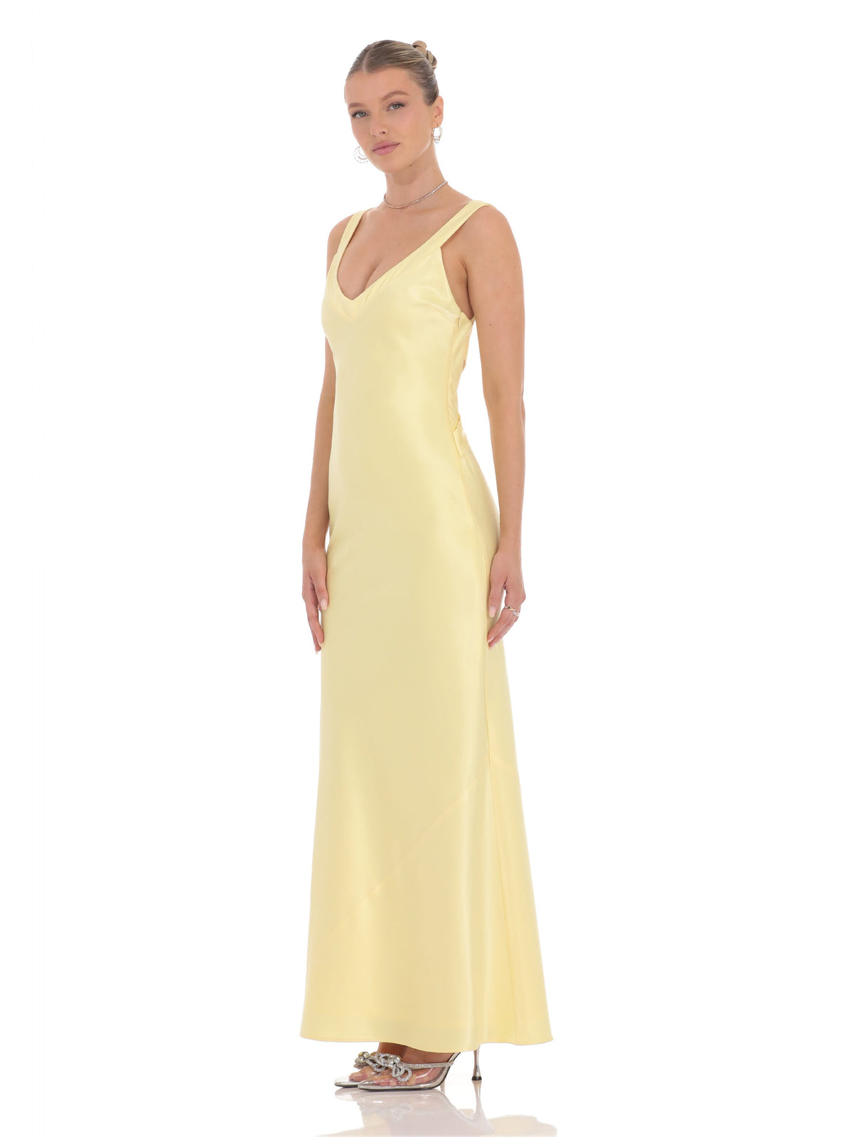 Yellow bridesmaid dress with satin construction and maxi hem