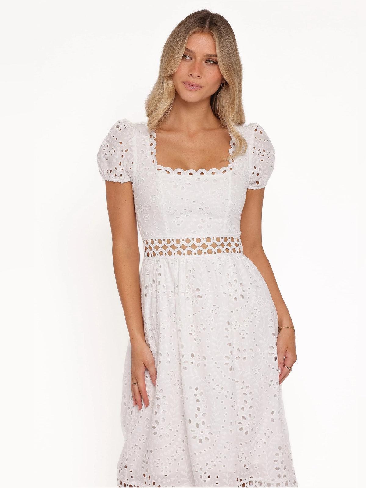 White midi formal dress with square lace neckline and puff sleeves, eyelet details