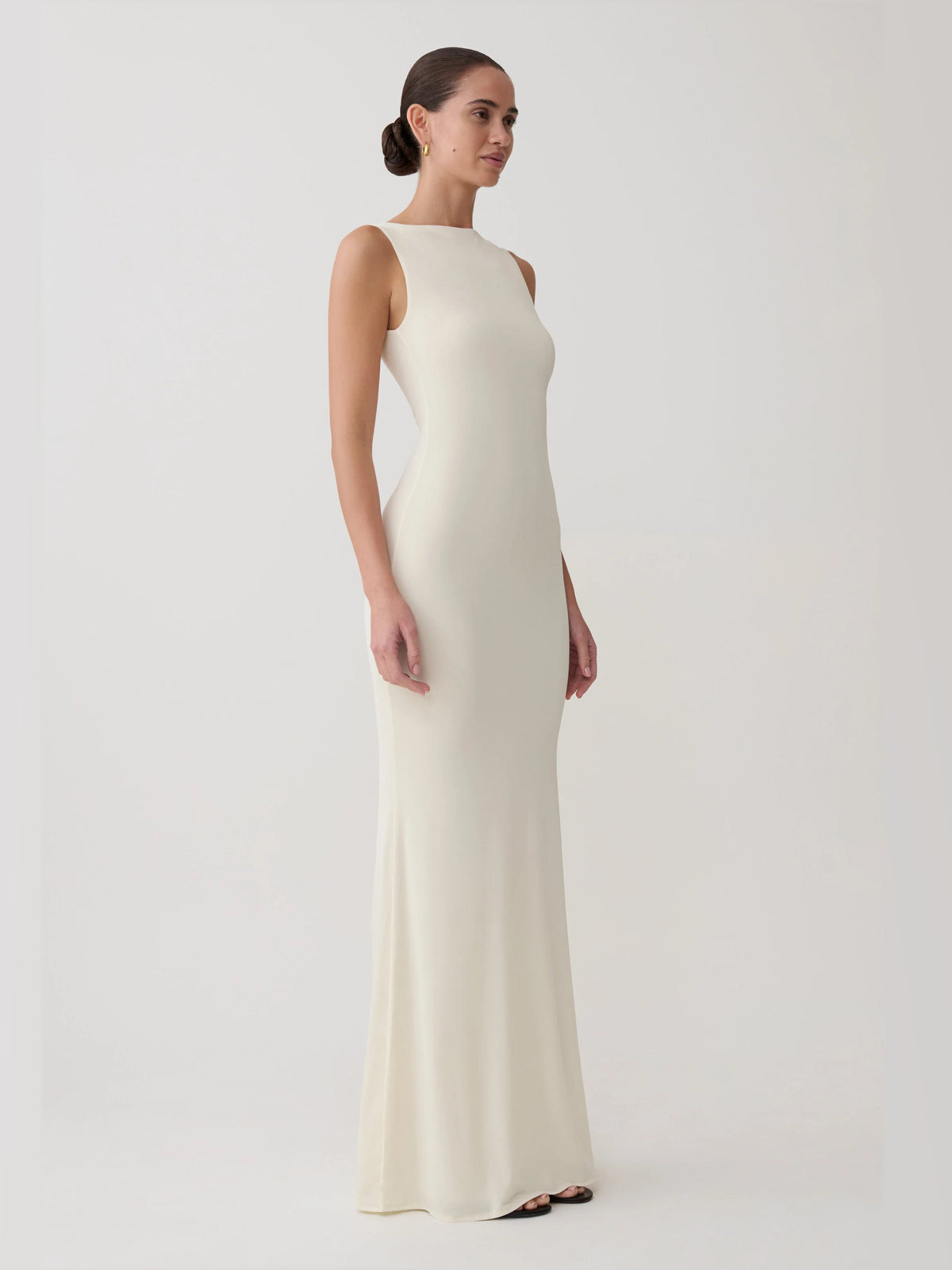 Bone formal dress with structured woven fabric construction and maxi hem