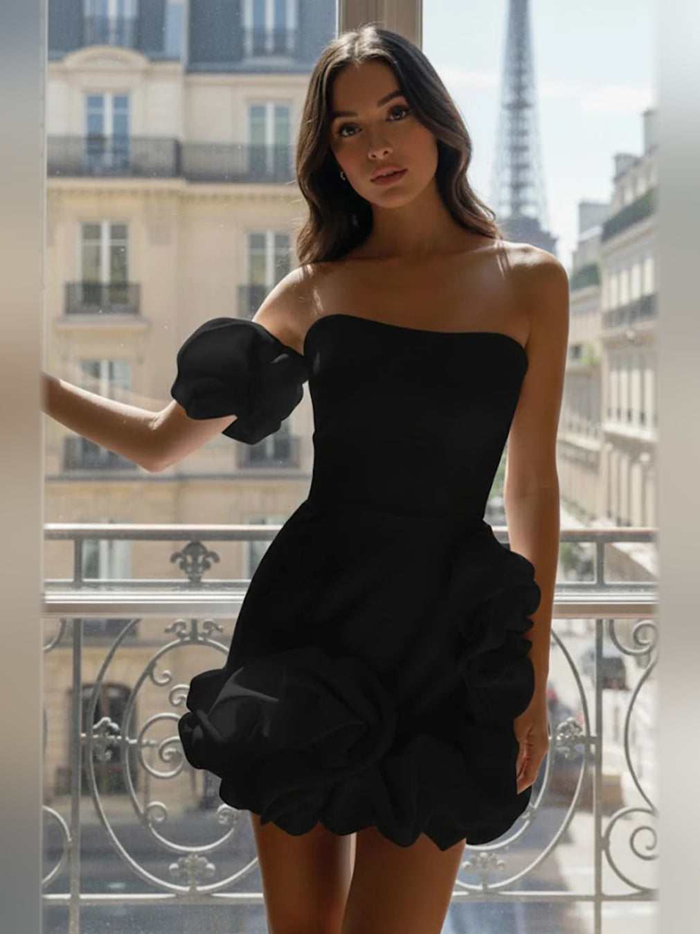 Ruffled strapless mini bodycon dress in black satin with puff sleeves and tiered skirt