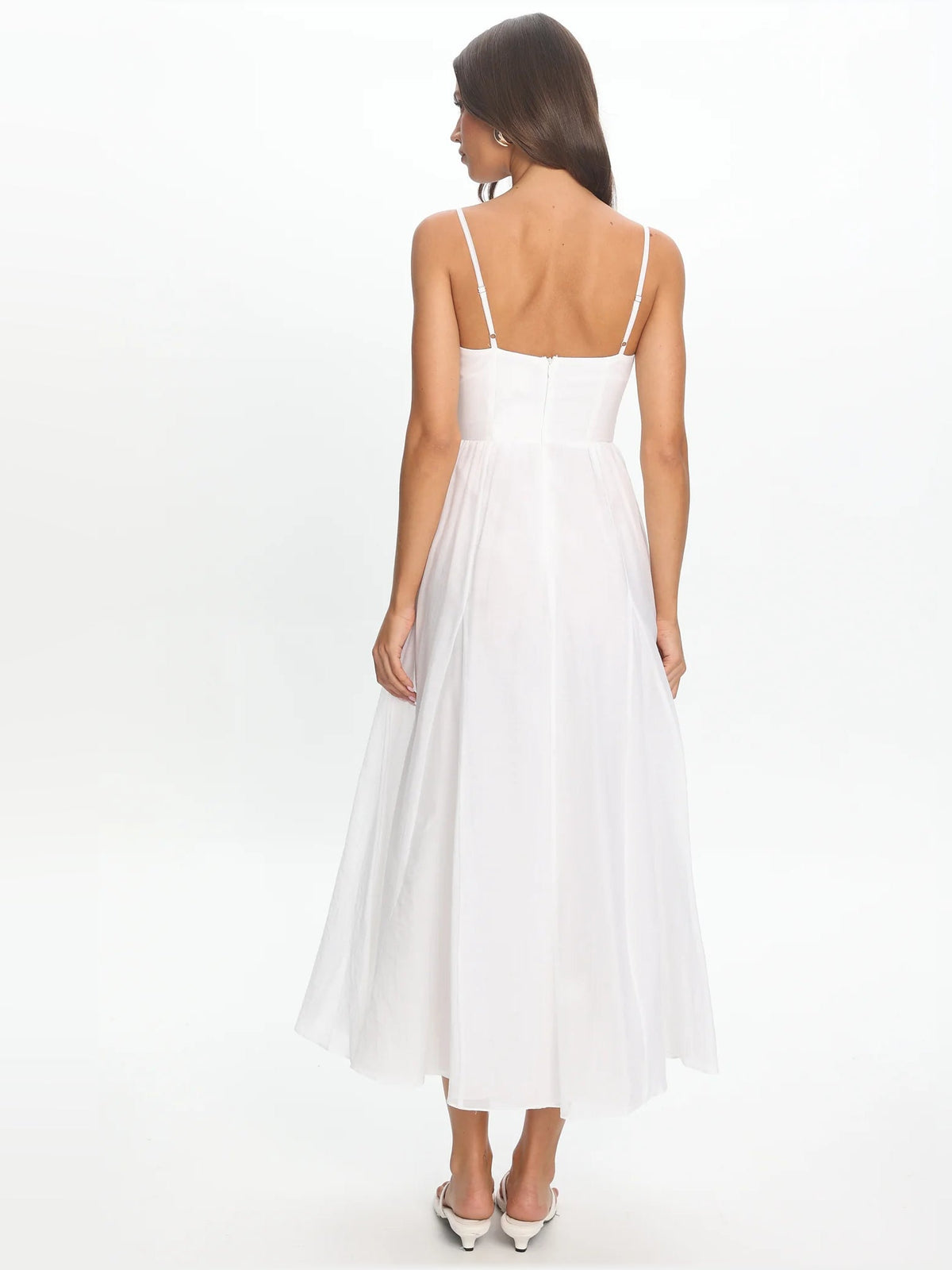 White midi formal dress back view with spaghetti straps and gathered skirt