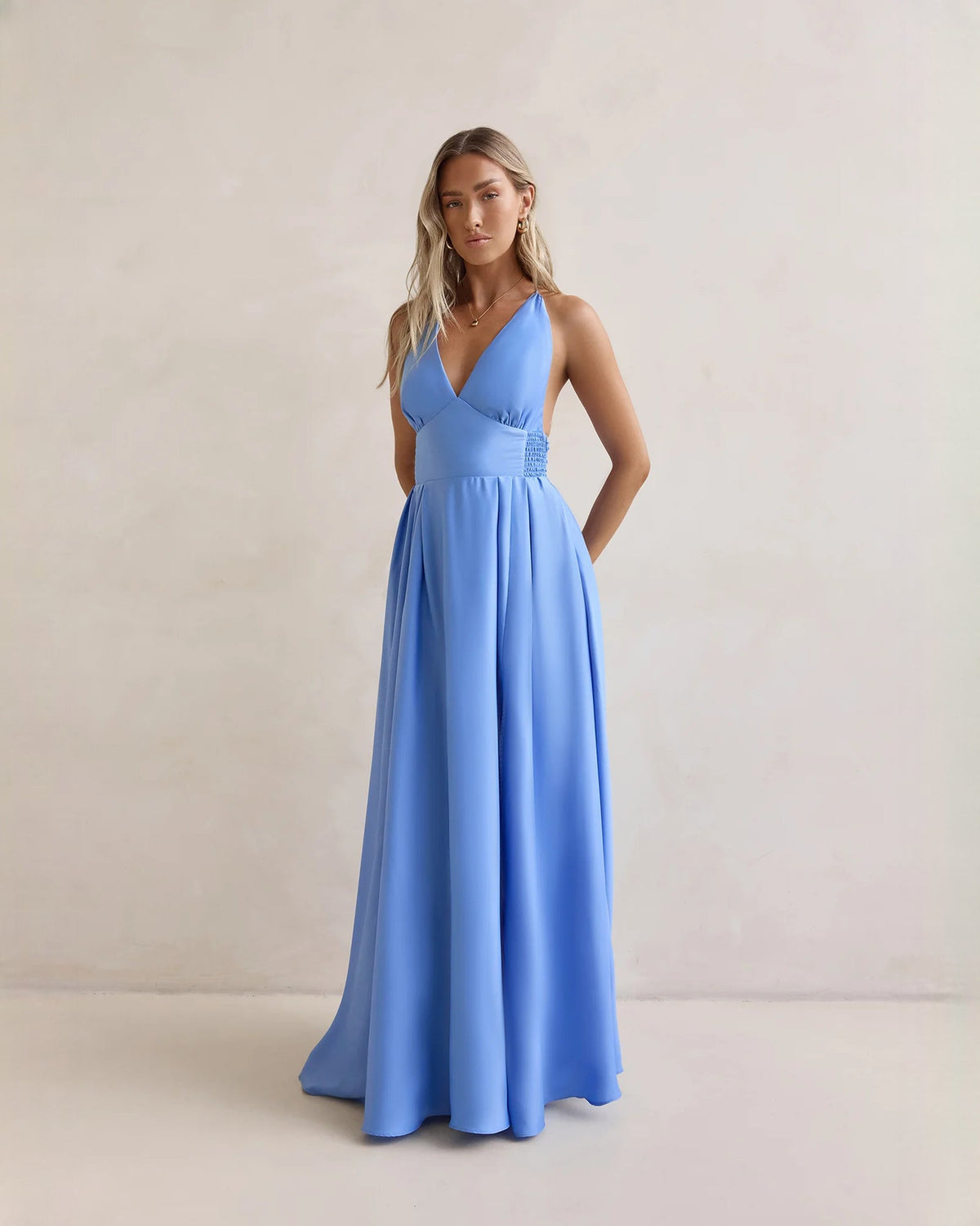 Periwinkle blue chiffon A-line maxi dress with V-neck, gathered waist, and full skirt