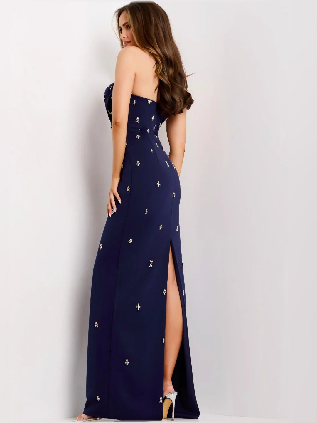 Navy sleeveless sheath formal dress with beaded pattern and side slit, floor length