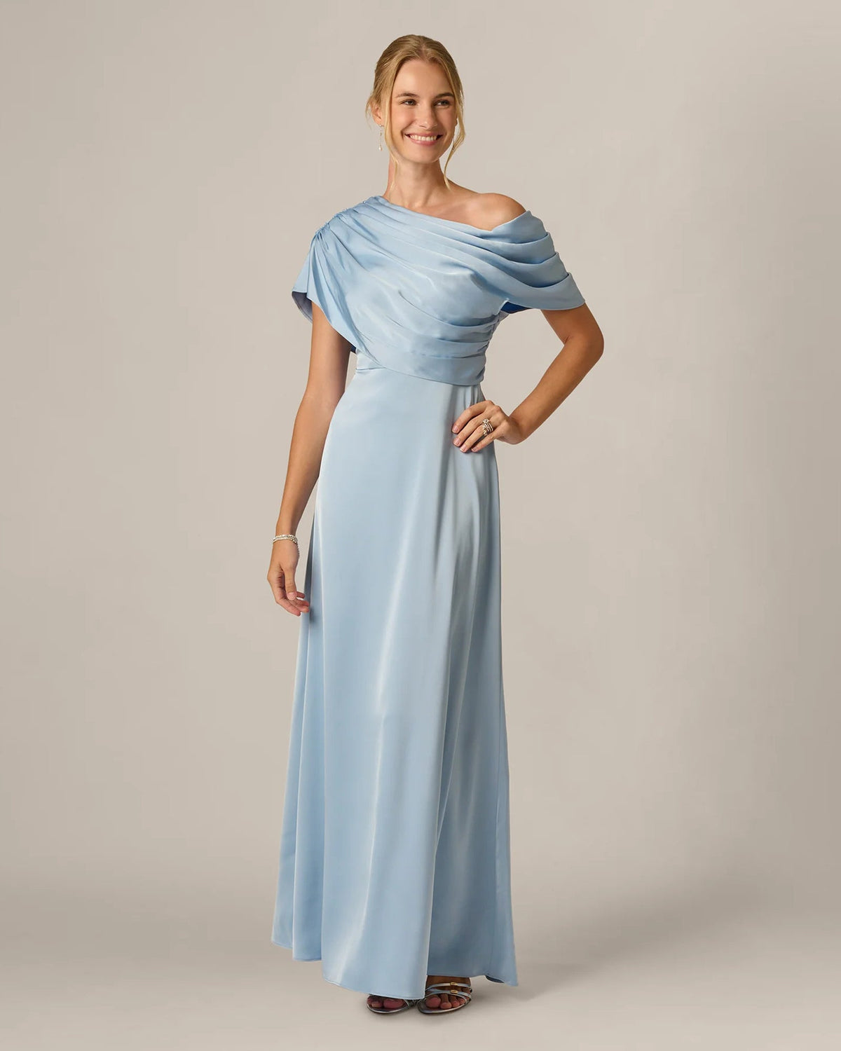 Powder blue draped one-shoulder maxi dress with A-line silhouette and cape-like shoulder