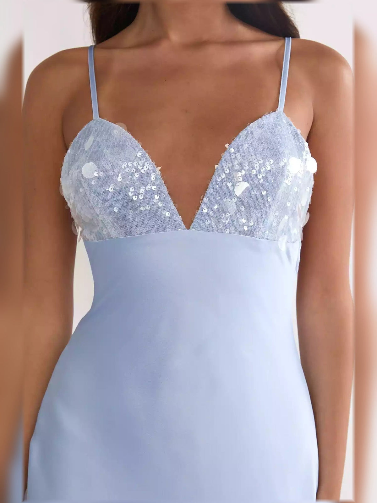 Light blue spaghetti strap dress with V-neck lace-sequin bodice detail