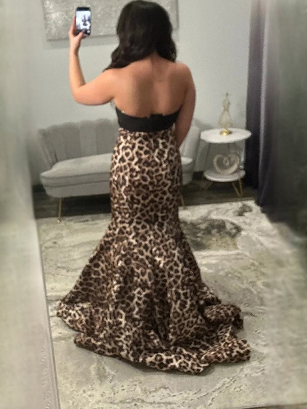 Back view: black satin prom dress with leopard print mermaid hem