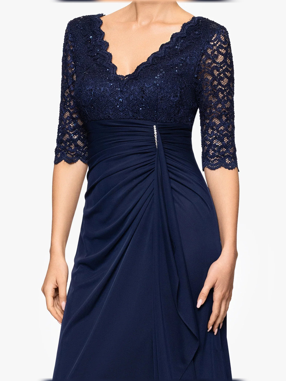 Dark navy V-neck lace bodice jersey gown with ruched draped waist and pleated skirt