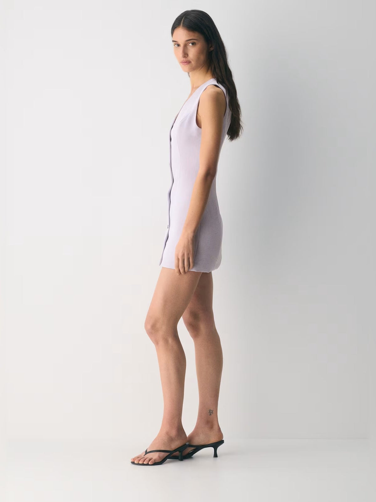 Lavender mini crepe homecoming dress, side view with sleeveless V-neck