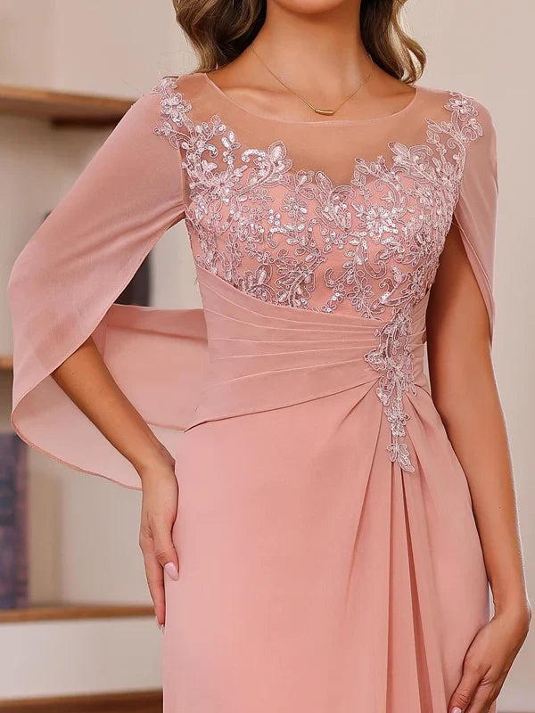 Pink chiffon sheath dress with floral appliqué bodice and cape sleeves