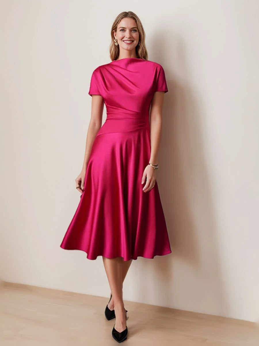 Hot pink satin cowl-neck A-line dress with draped skirt and short sleeves, knee length.