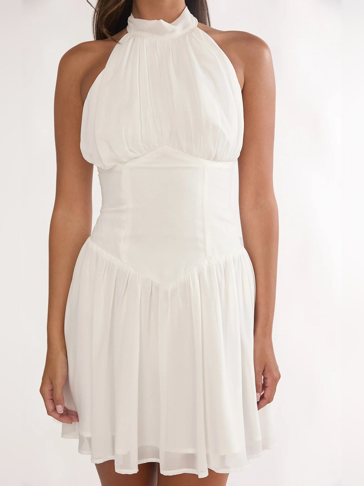 White high-neck halter mini dress with gathered bodice and layered tier skirt