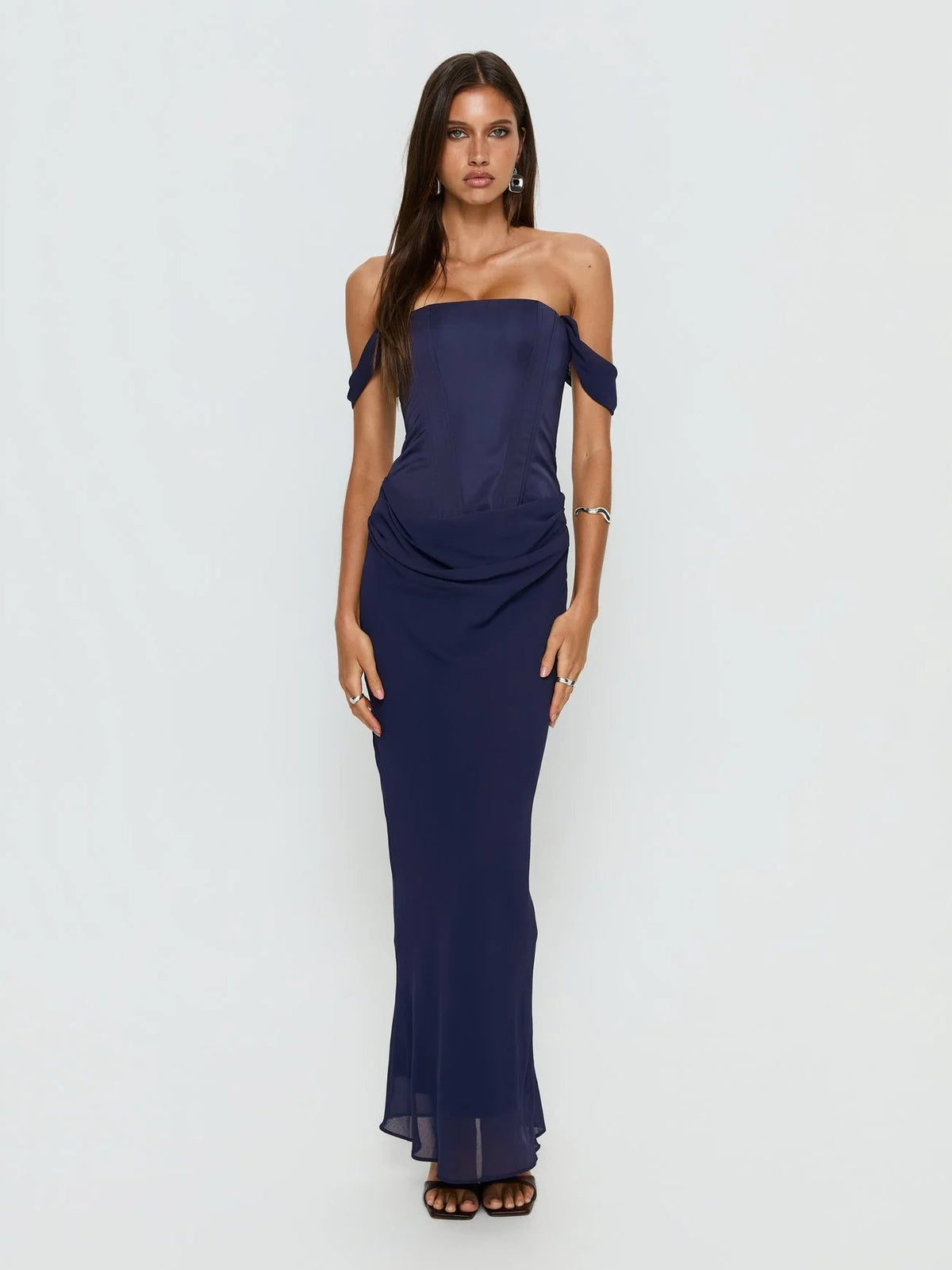Navy formal dress with structured woven fabric construction and maxi hem