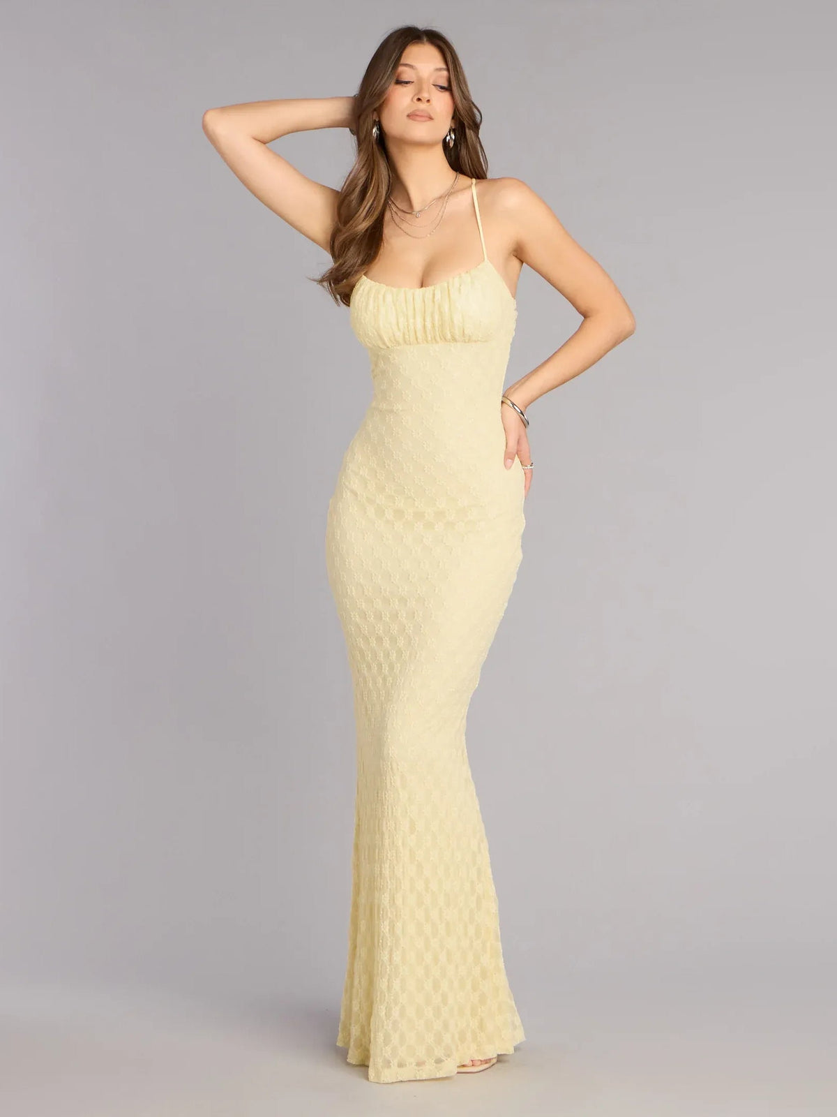 Yellow sweetheart formal dress with spaghetti straps and ruched detailing, front view, floor-length