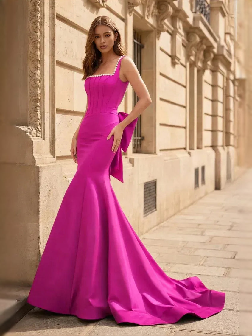 Fuchsia corset bow square-neck mermaid satin prom dress with pearl-trim straps