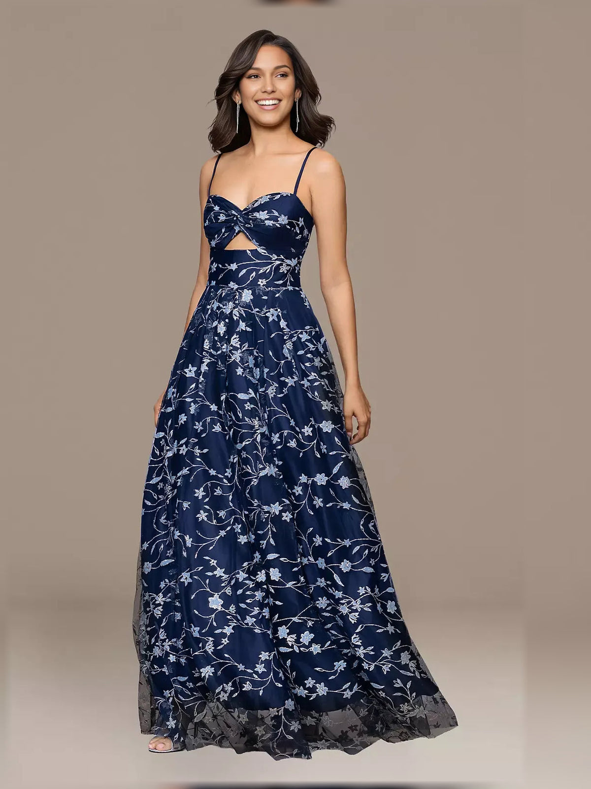 Navy floral print formal dress with sweetheart neckline, bow detail, and full skirt