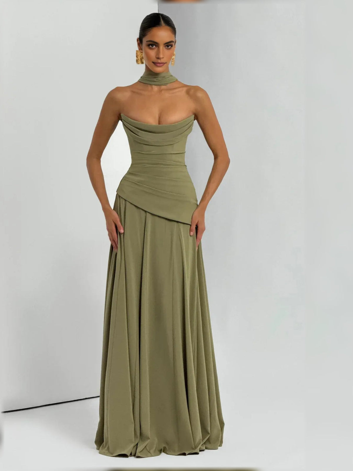 Dusty sage strapless corset formal dress with fitted waist and flowing floor-length skirt