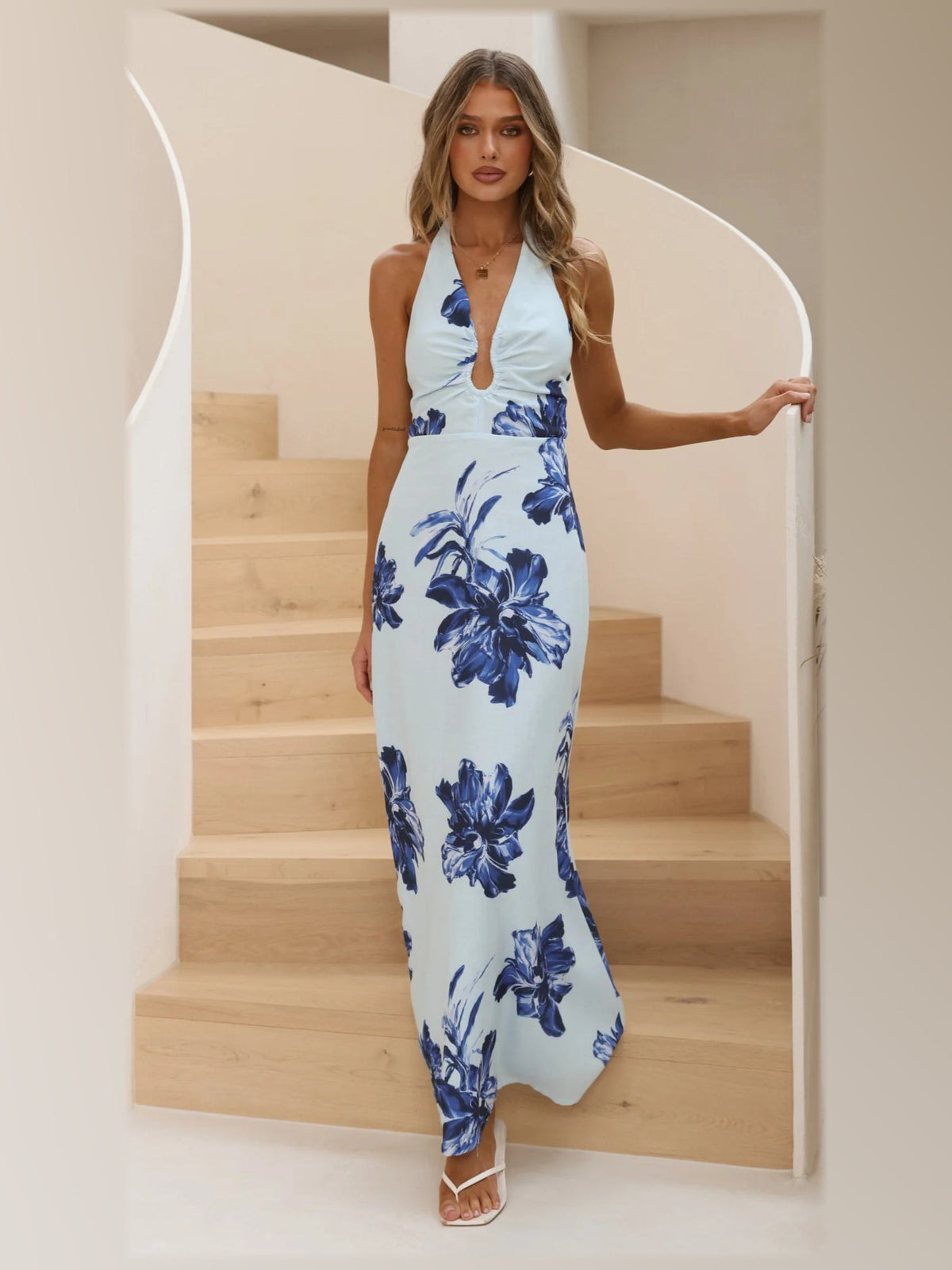 Ivory formal dress with structured woven fabric construction and maxi hem