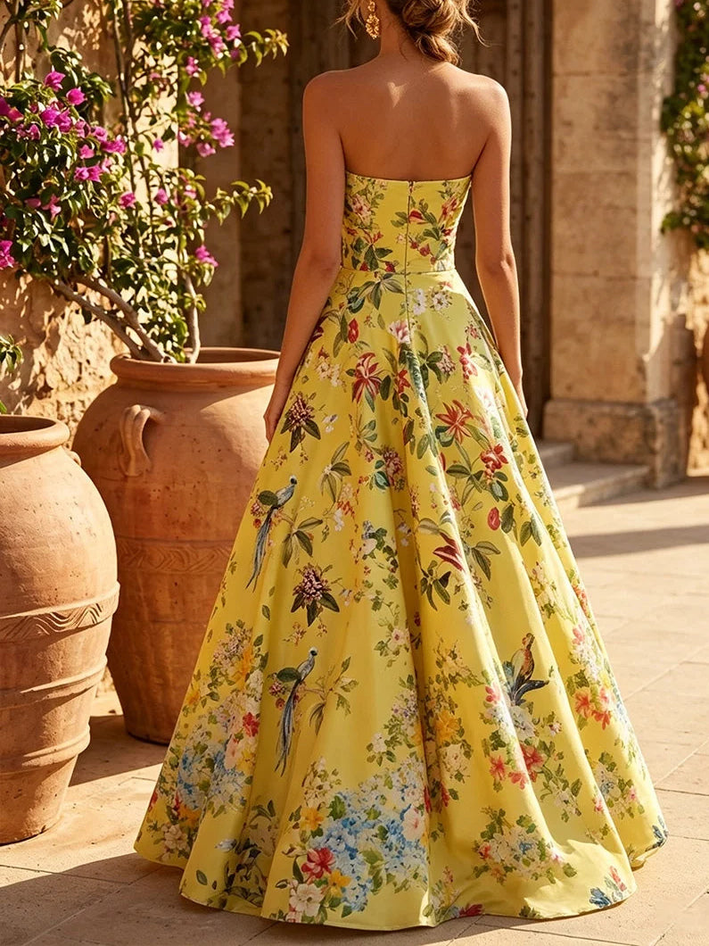 Back view of floral strapless A-line prom dress in yellow satin, floor-length