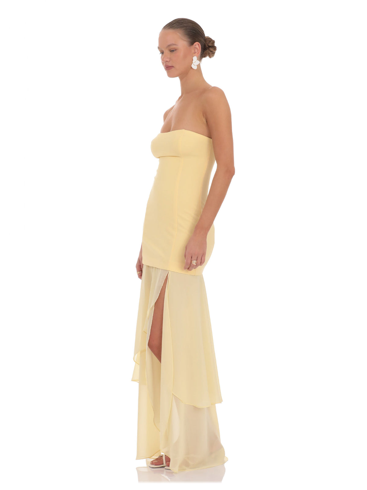 Yellow bridesmaid dress with structured woven fabric construction and maxi hem
