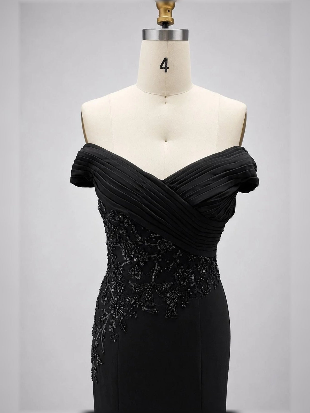 Black off-shoulder ruched neckline mermaid gown with sparkling lace bodice