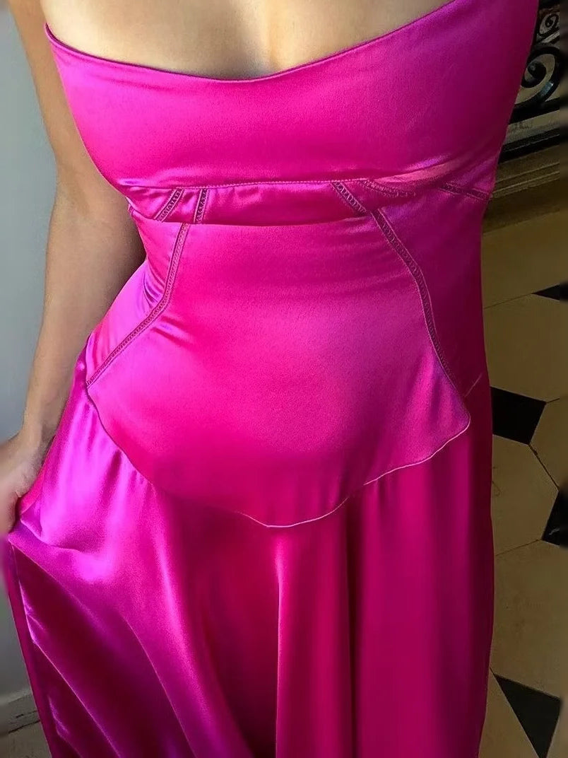 Hot pink satin square-neck prom dress bodice detail with seam lines and gathered waist.