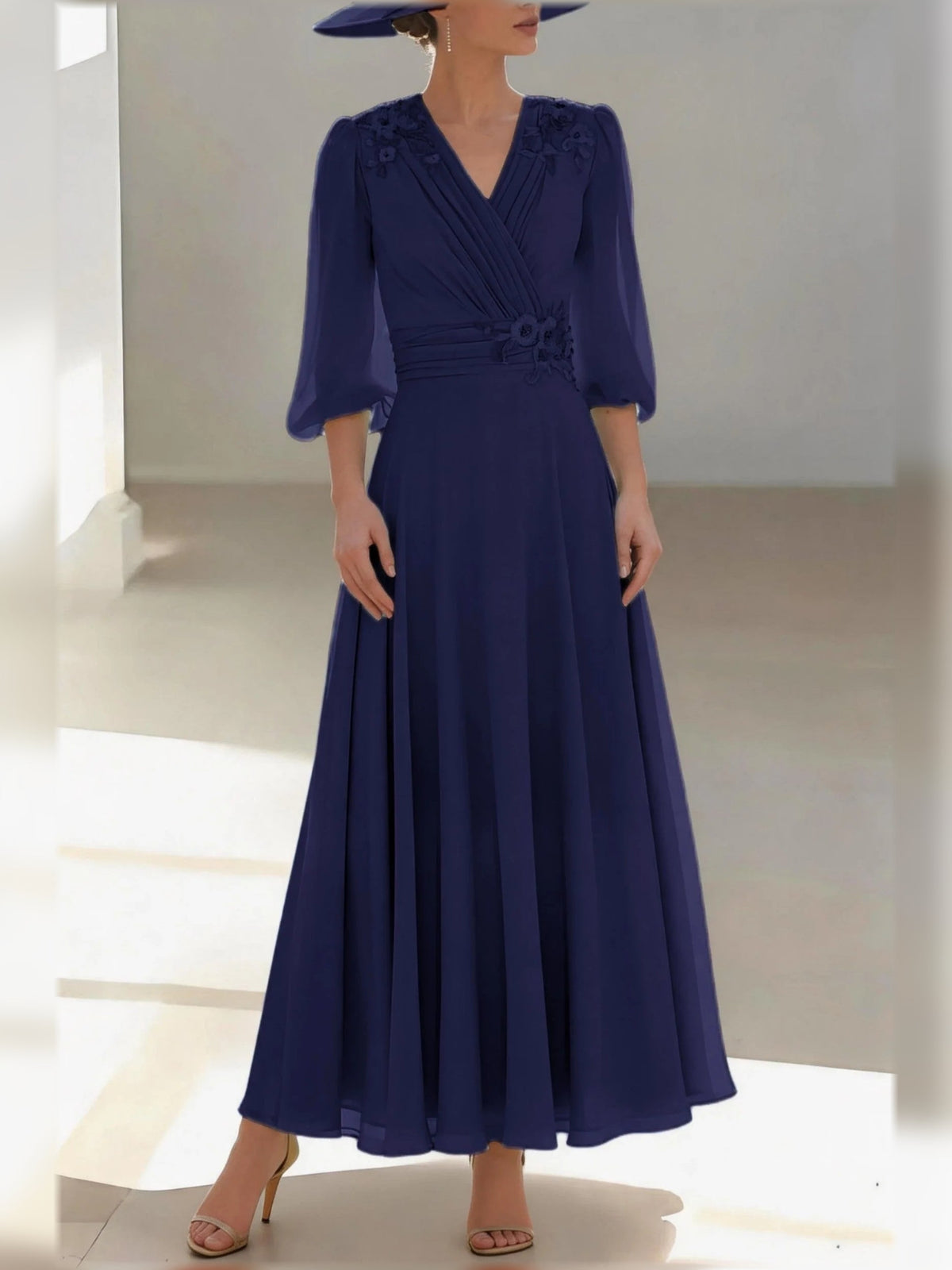 Dark navy chiffon V-neck A-line dress with floral applique, 3/4 sleeves, pleated full skirt