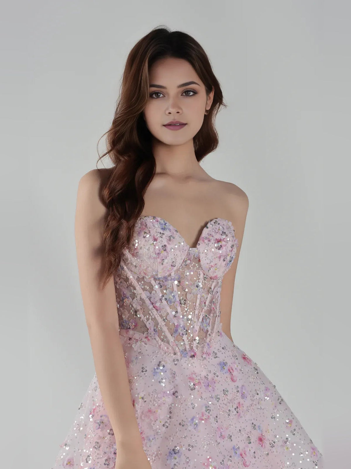 Light pink sequin sweetheart mini dress with corset bodice and beaded sparkle detail