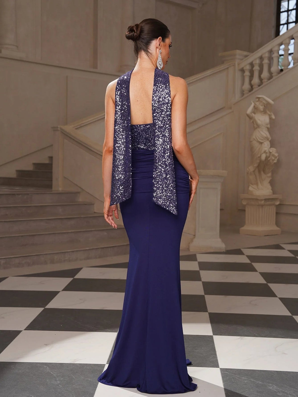 Dark navy backless mermaid prom dress with sequin back panel and ruched waist