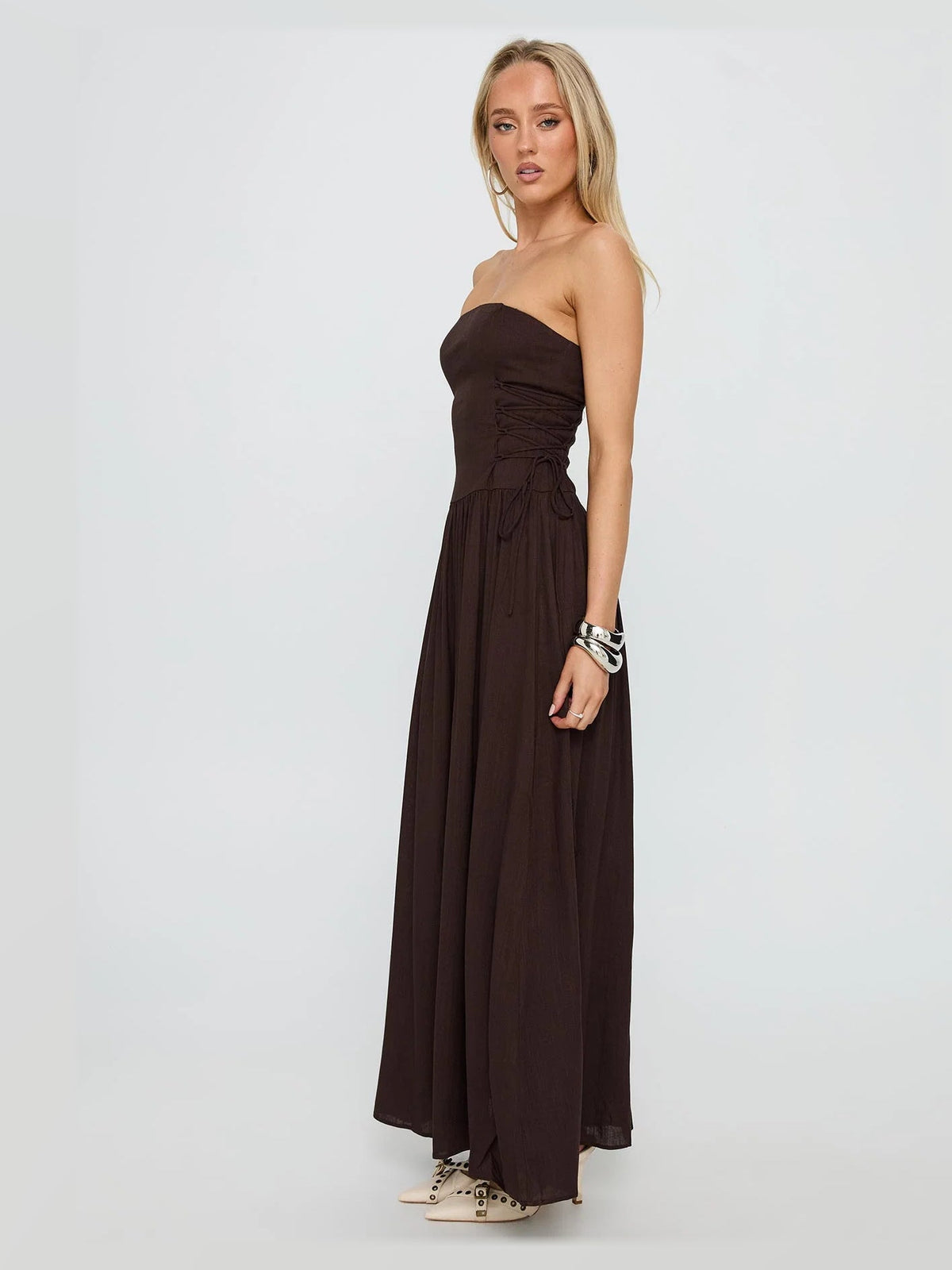 Chocolate formal dress with structured woven fabric construction and maxi hem