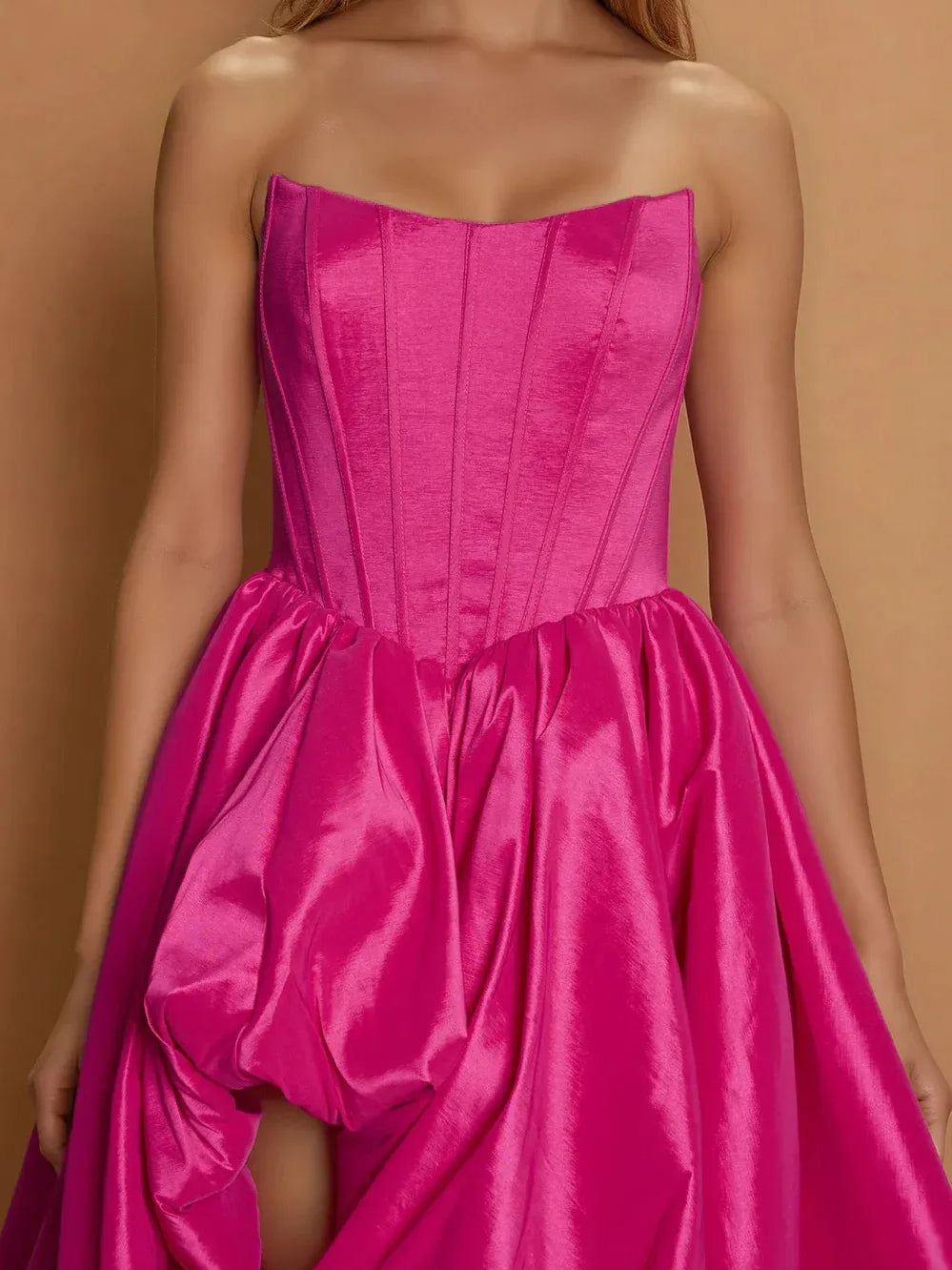 Fuchsia strapless corset bodice with gathered ruffle skirt detail