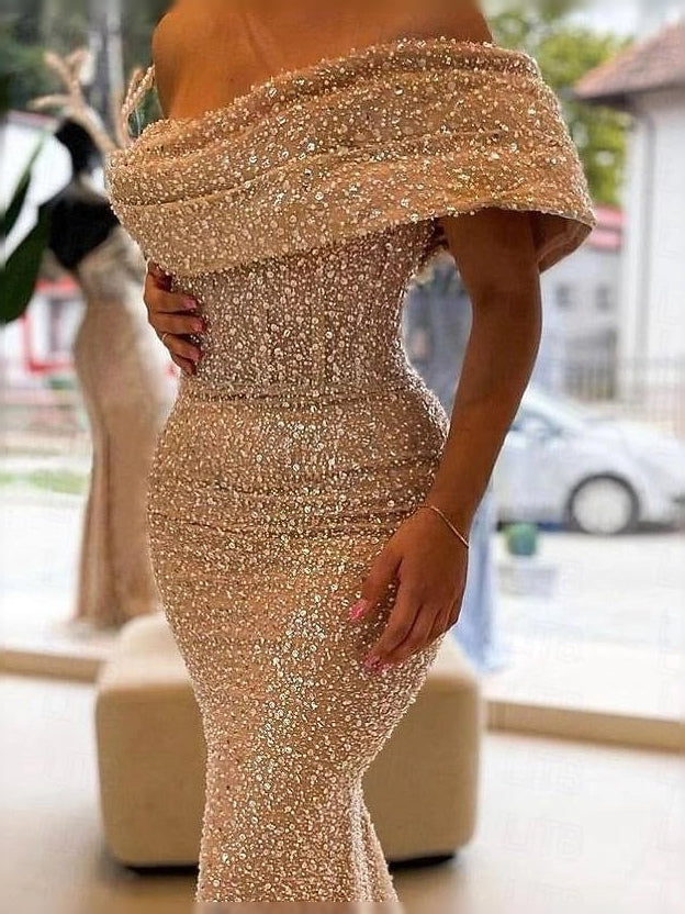Gold glitter tulle mermaid maxi dress with wide ruffled off-shoulder and ruched bodice