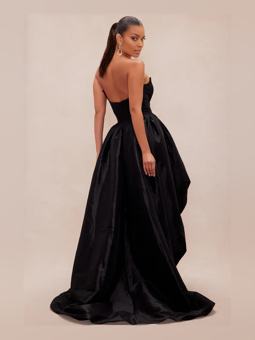 Black strapless corset high-low A-line prom dress, draped back and full layered skirt