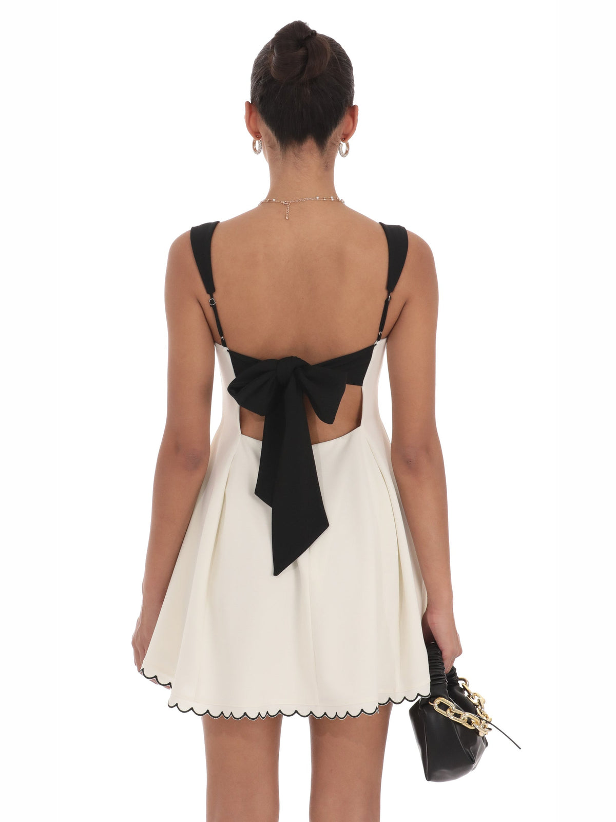 White homecoming dress with structured woven fabric construction and maxi hem