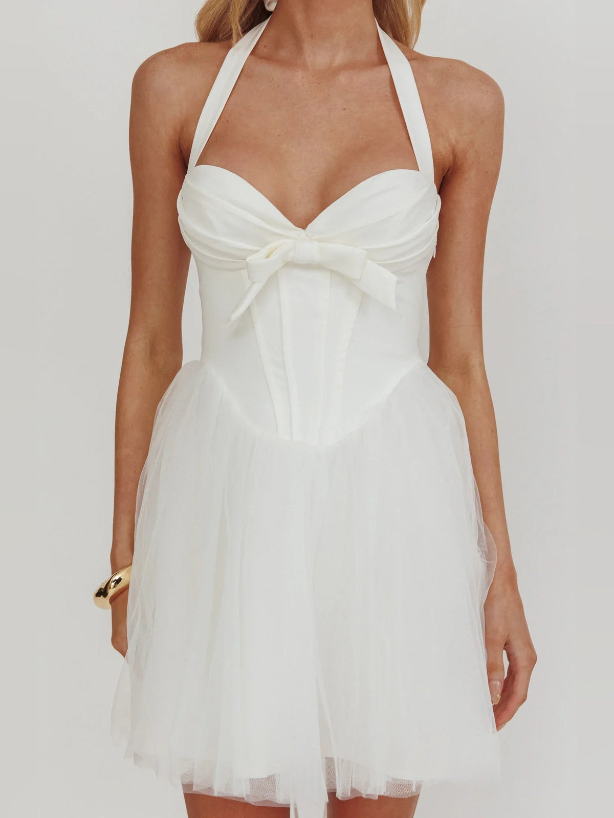 White halter corset mini dress with front bow and layered tulle skirt