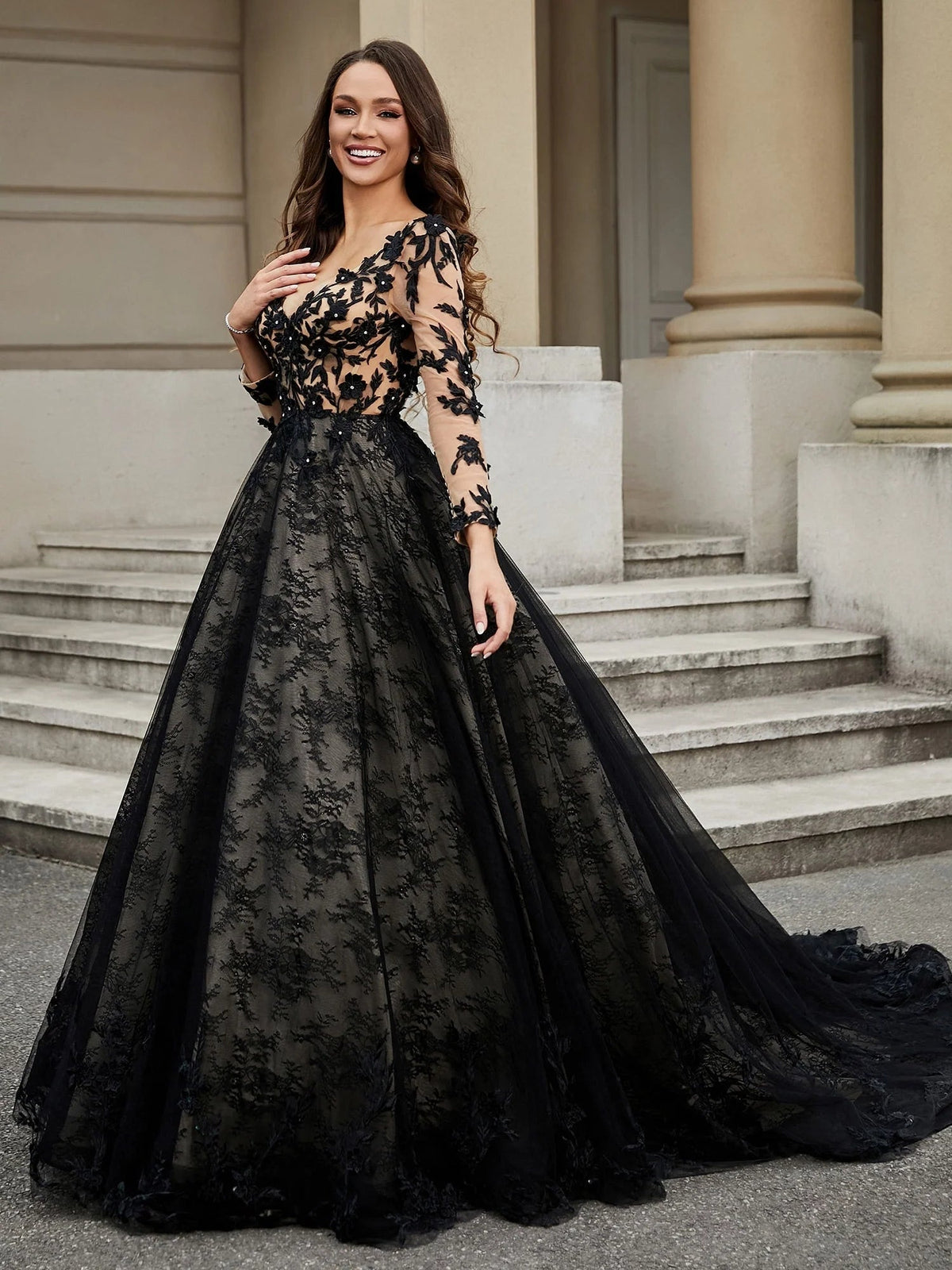 Black V-neck tulle wedding dress with floral applique bodice and full A-line skirt