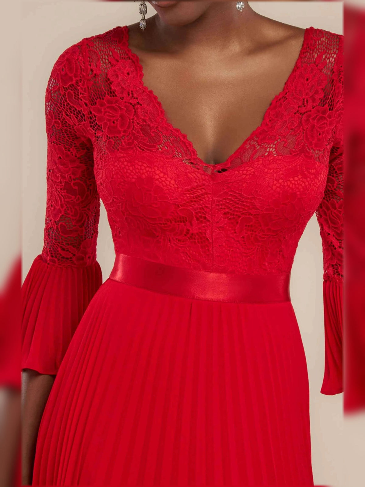 Red lace V-neck bodice with fitted waist and pleated A-line maxi skirt