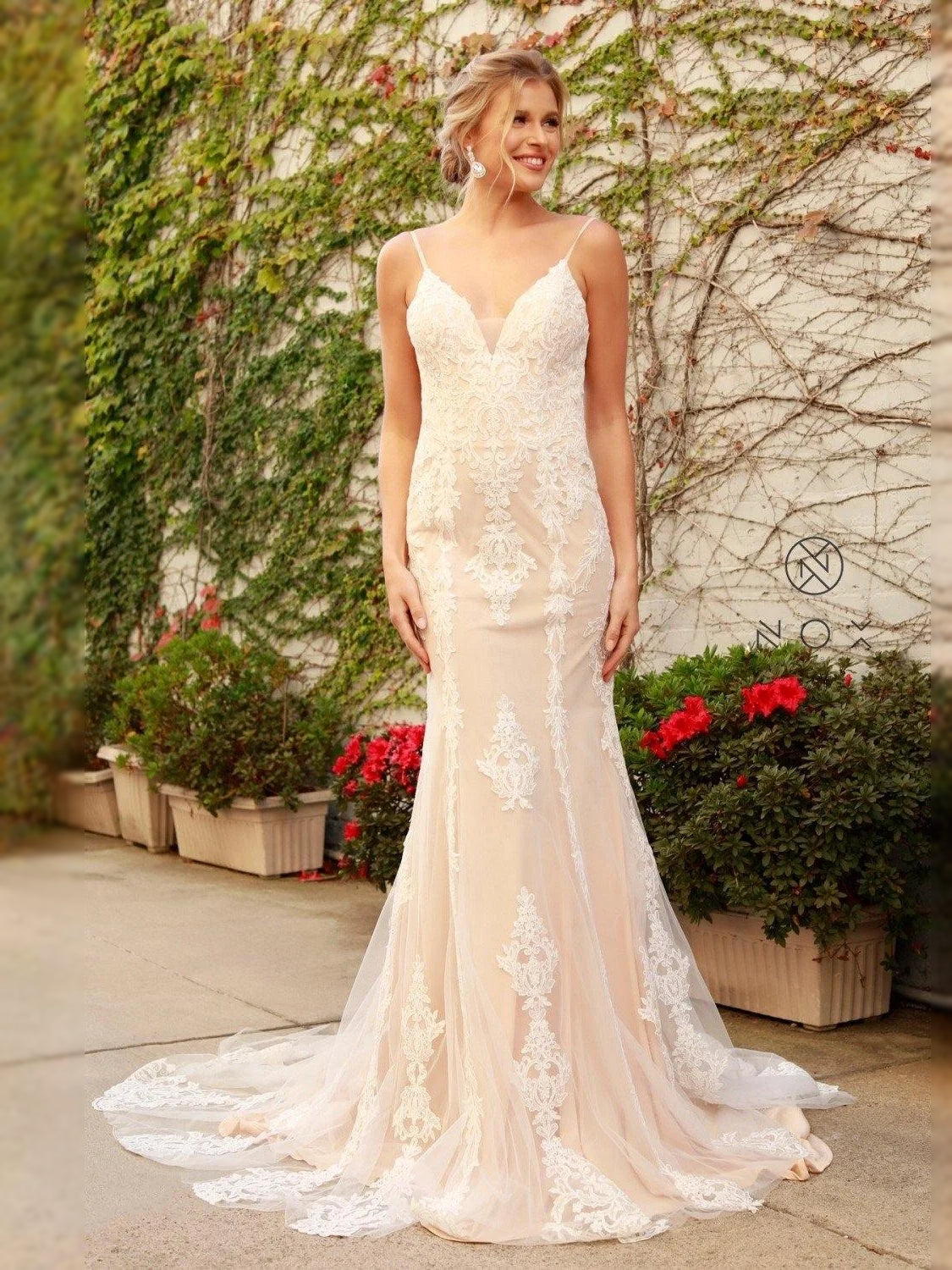 Ivory V-neck mermaid wedding dress with lace embroidery and long tulle train