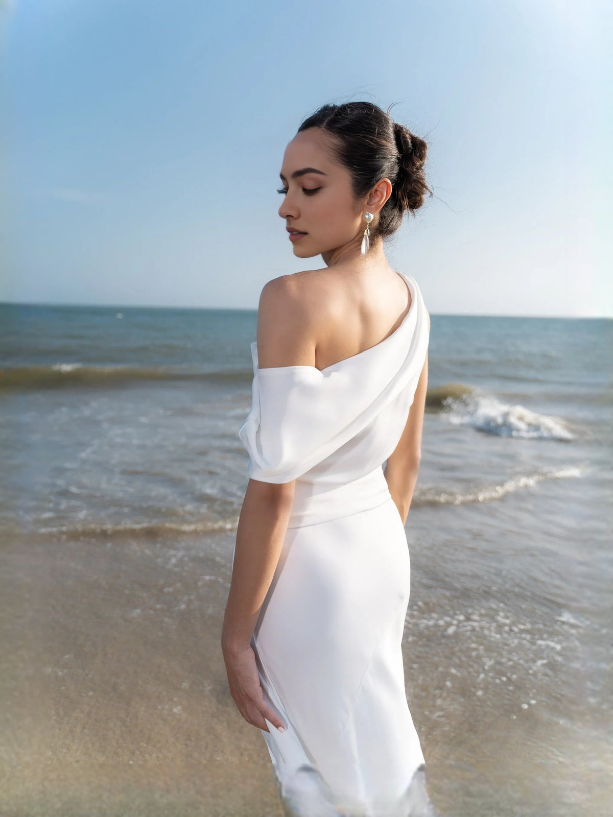 Ivory satin one-shoulder draped sheath wedding dress, open-back look with waist gathers