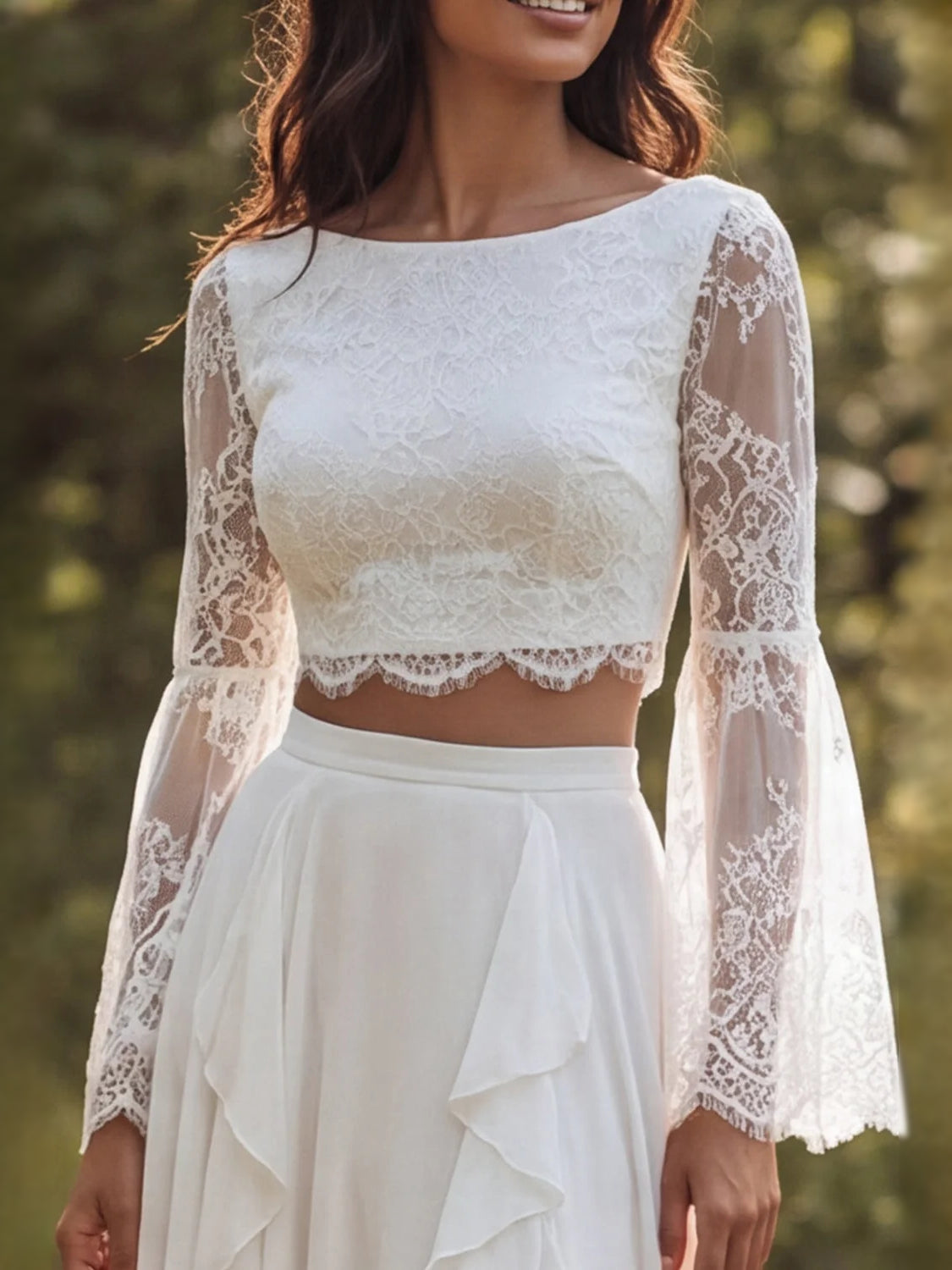 Ivory lace cropped top with bateau neckline and sheer long sleeves, layered ruffle slit skirt