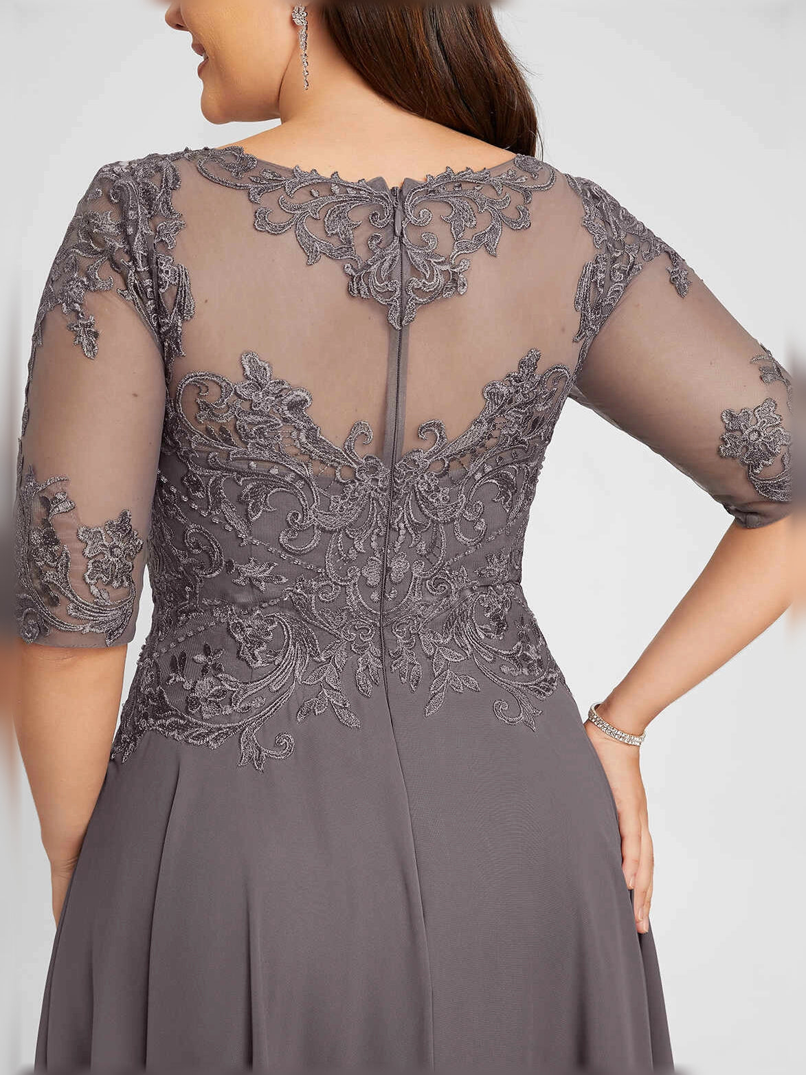 Steel grey embroidered illusion back detail on an A-line midi chiffon dress