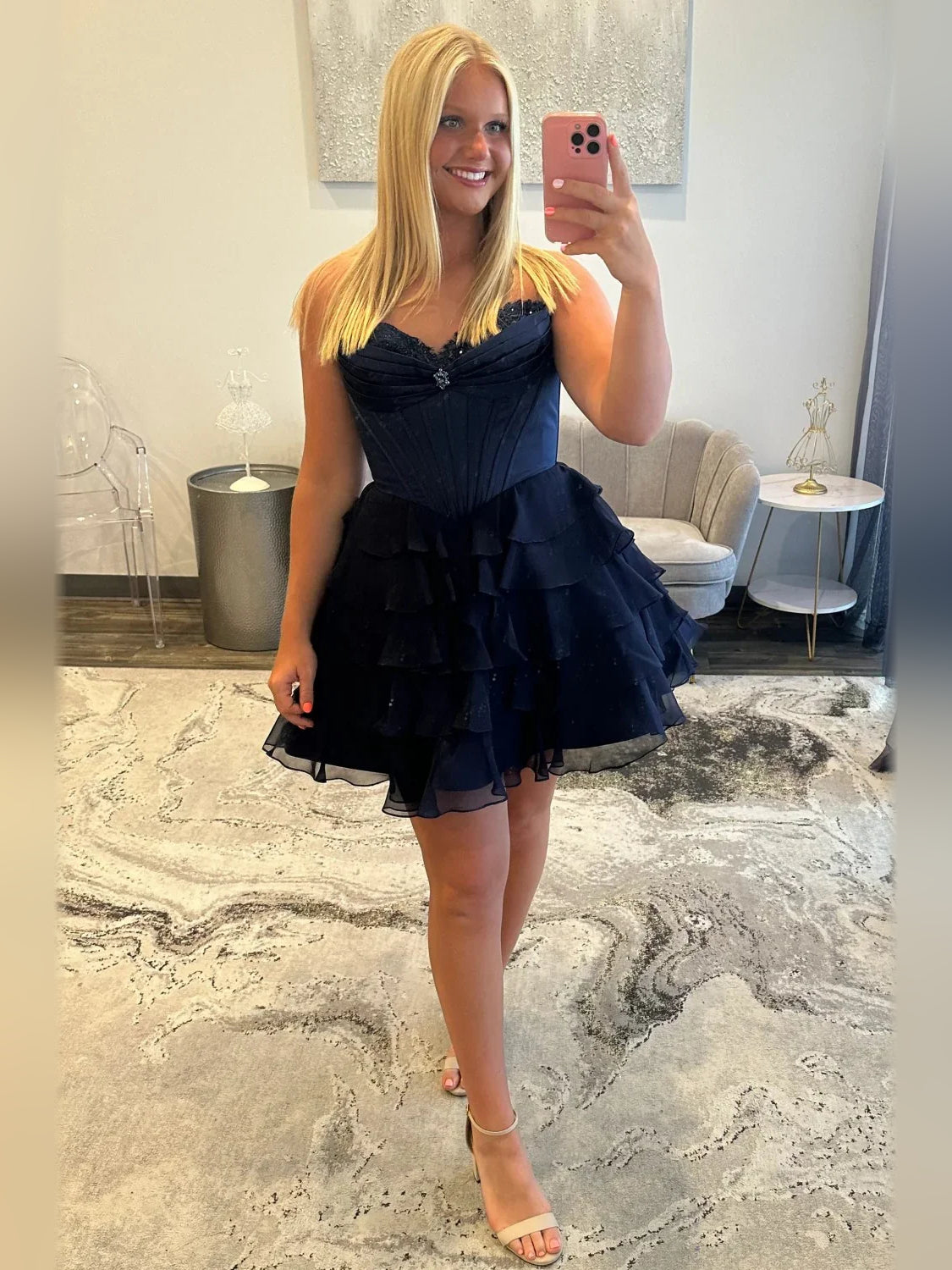 Navy satin corset dress with sweetheart neckline and tiered ruffle skirt