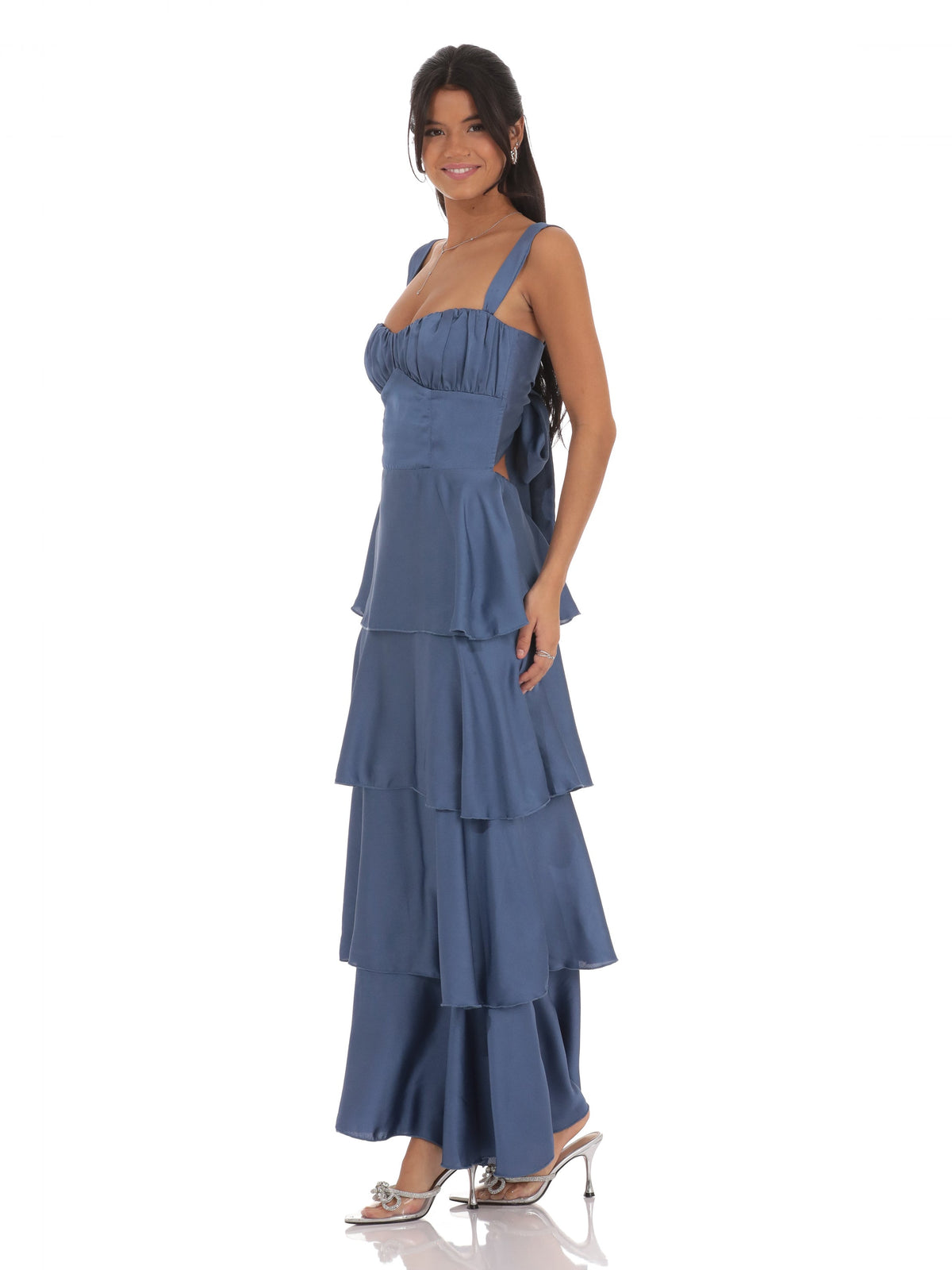 Slate blue satin tiered maxi dress with ruched bodice and spaghetti straps, side view.