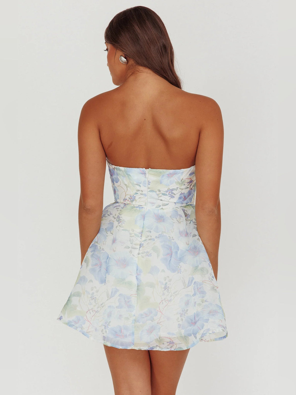 Blue floral mini dress with strapless open-back design and flared skirt