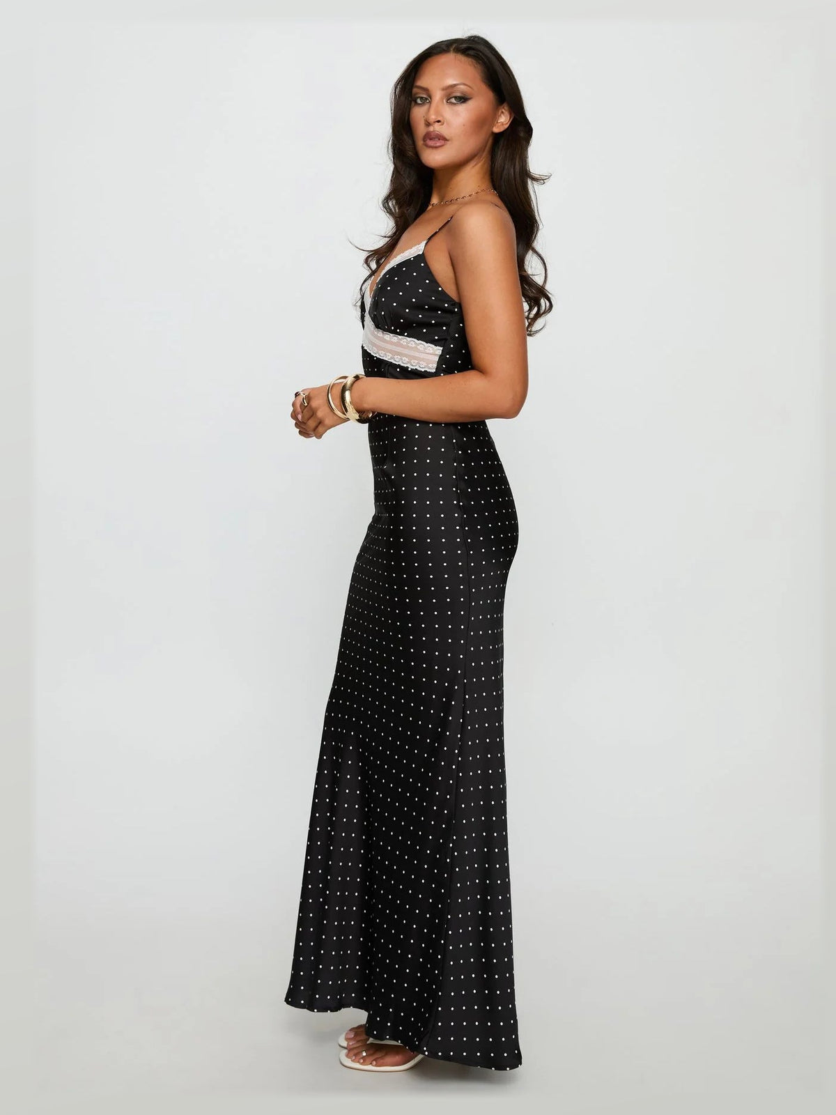 Black formal dress with mesh construction and maxi hem
